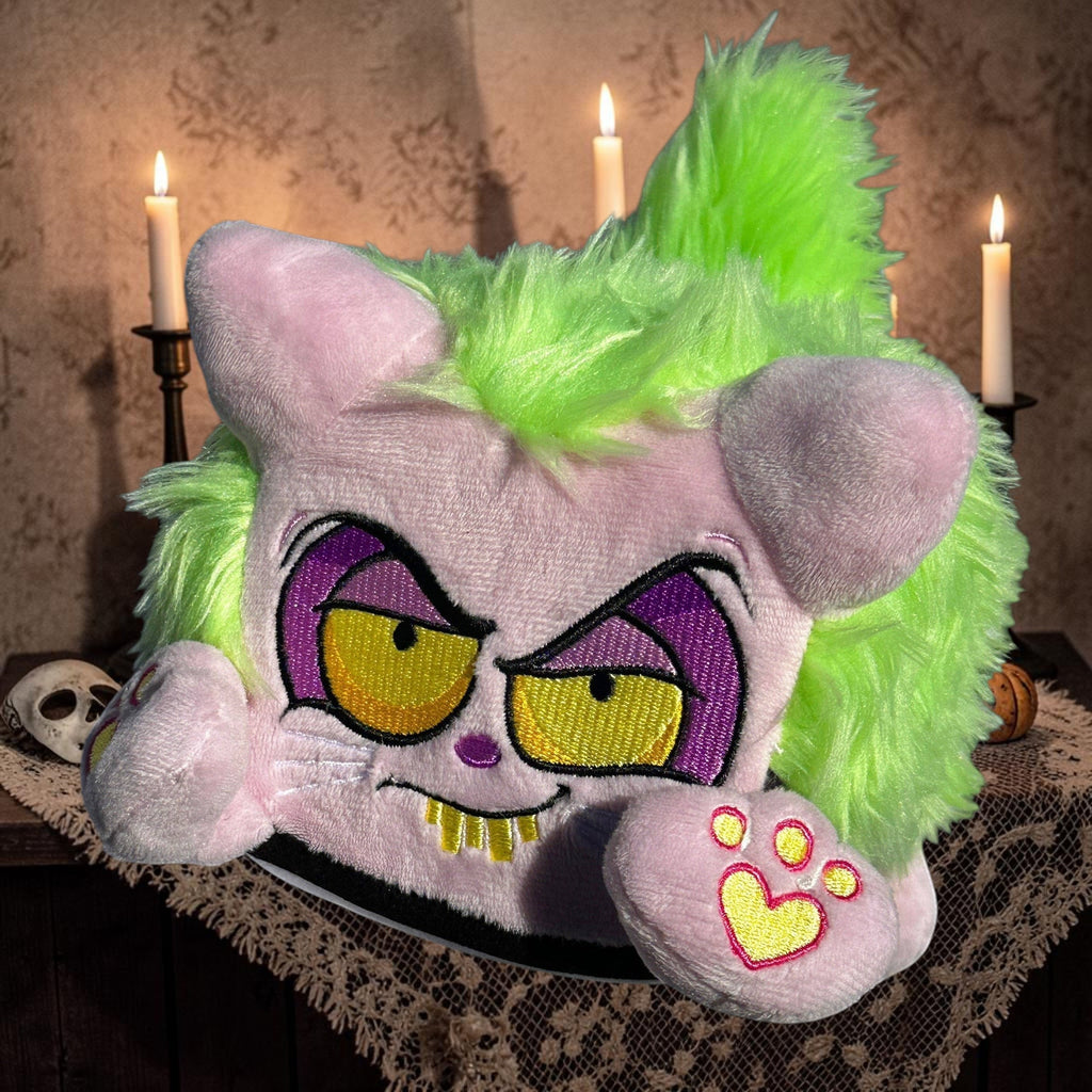 Halloween-Emporium spooky plush character pillow with a lavender body, neon green faux fur, and embroidered details.