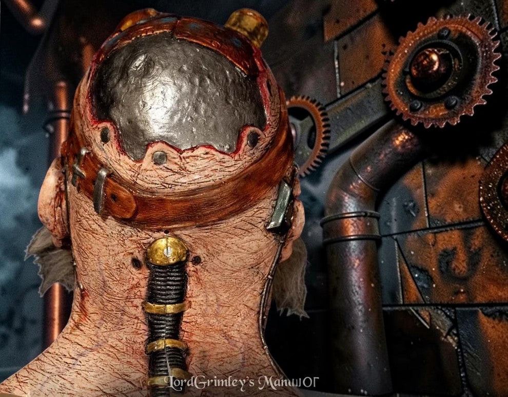 Halloween-Emporium Doctor Thaddeus Tinkers latex mask showing back view with metallic head plate and industrial tubing