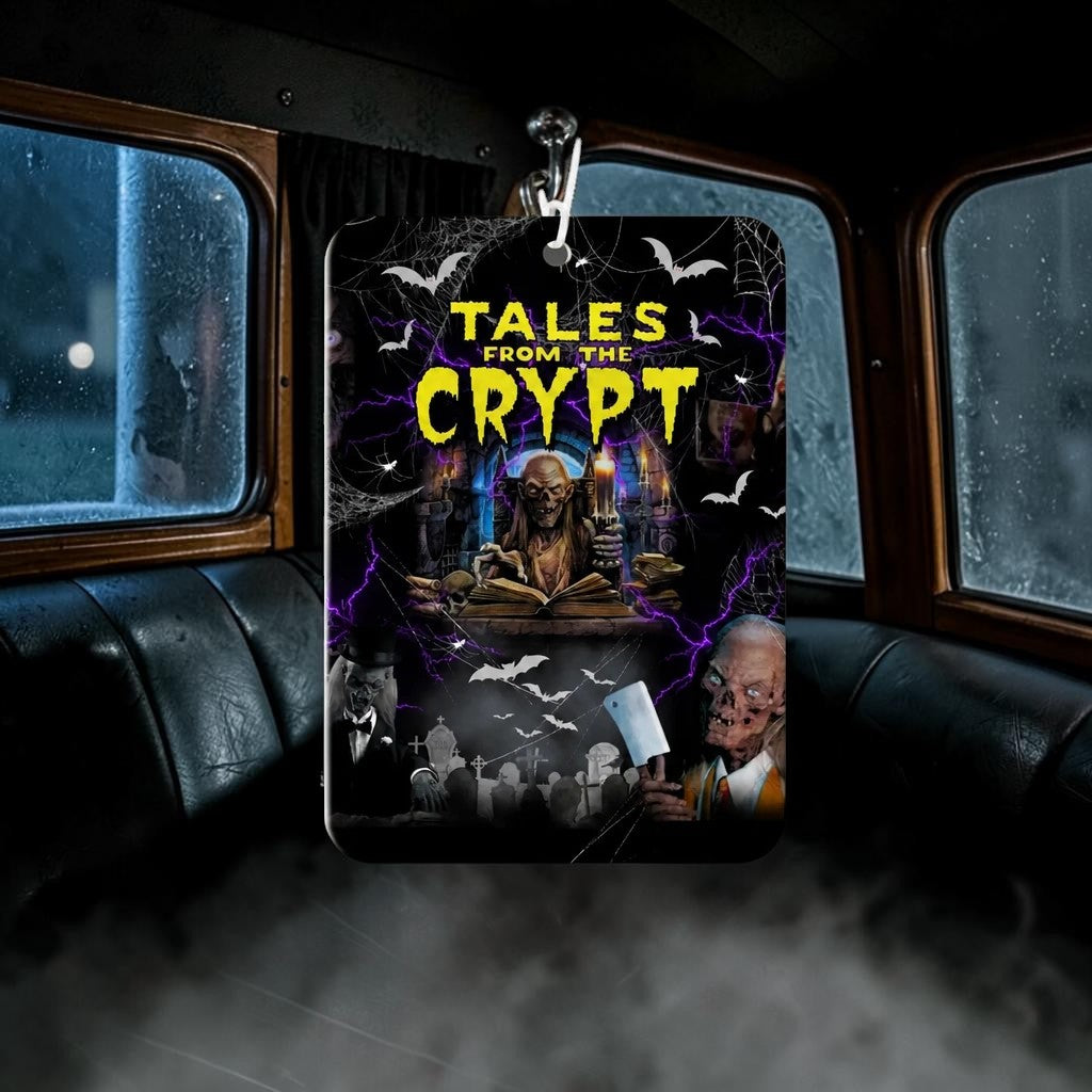 Halloween-Emporium Tales from the Crypt honeysuckle car air freshener featuring the Crypt Keeper in a dark graveyard