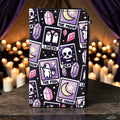 Halloween-Emporium tarot cards vinyl wallet with purple and black mystical print, featuring skulls and ghosts.