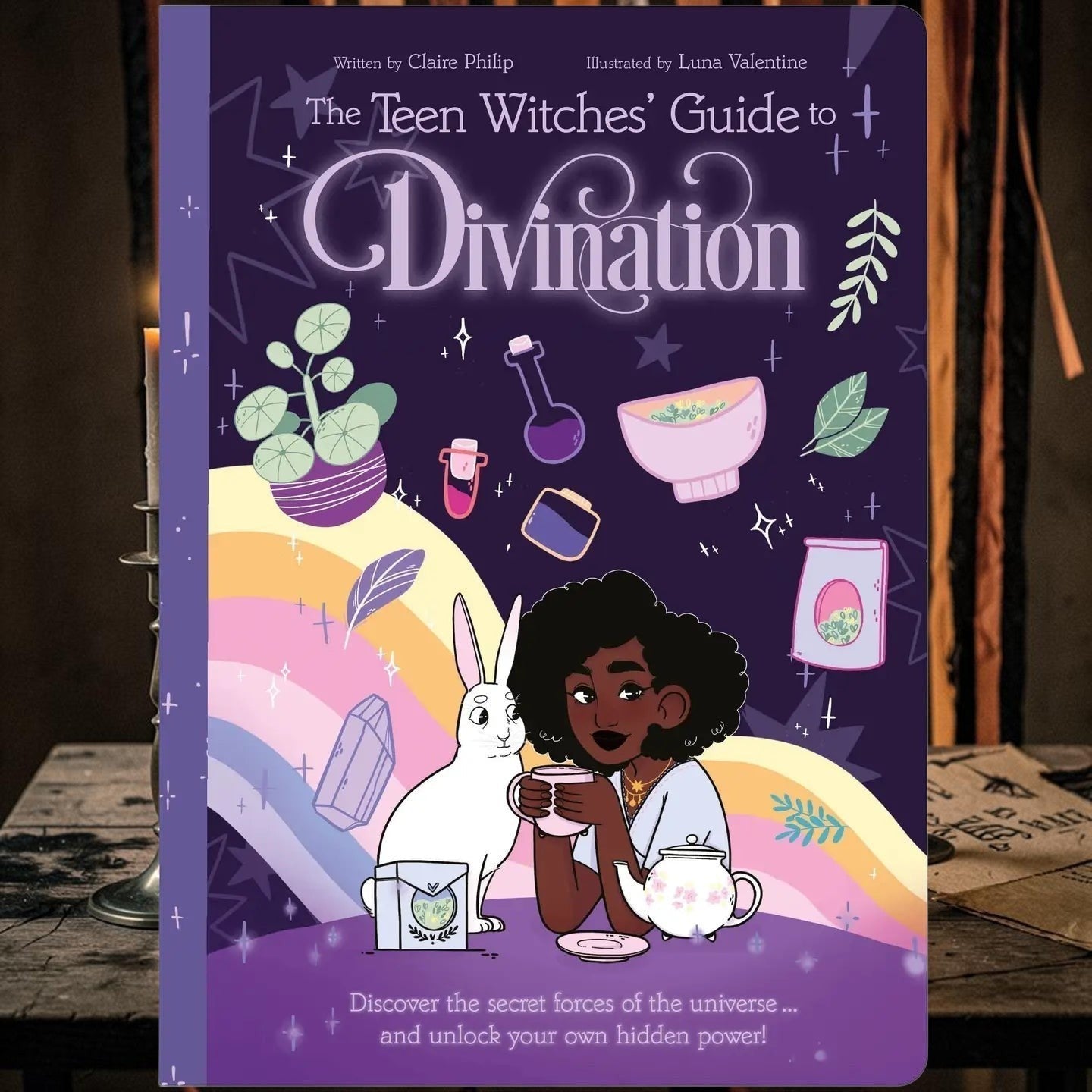 Halloween-Emporium Teen Witches' Guide to Divination paperback book with purple cover and magical illustrations