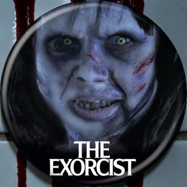 Halloween-Emporium The Exorcist Regan 1.25-inch round pinback button featuring a close-up of the iconic horror character.