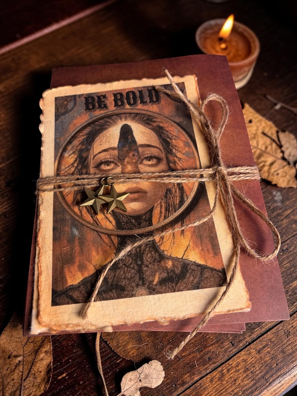 Halloween-Emporium Third Eye greeting card set with distressed edges, twine, and star charms on a wooden table.