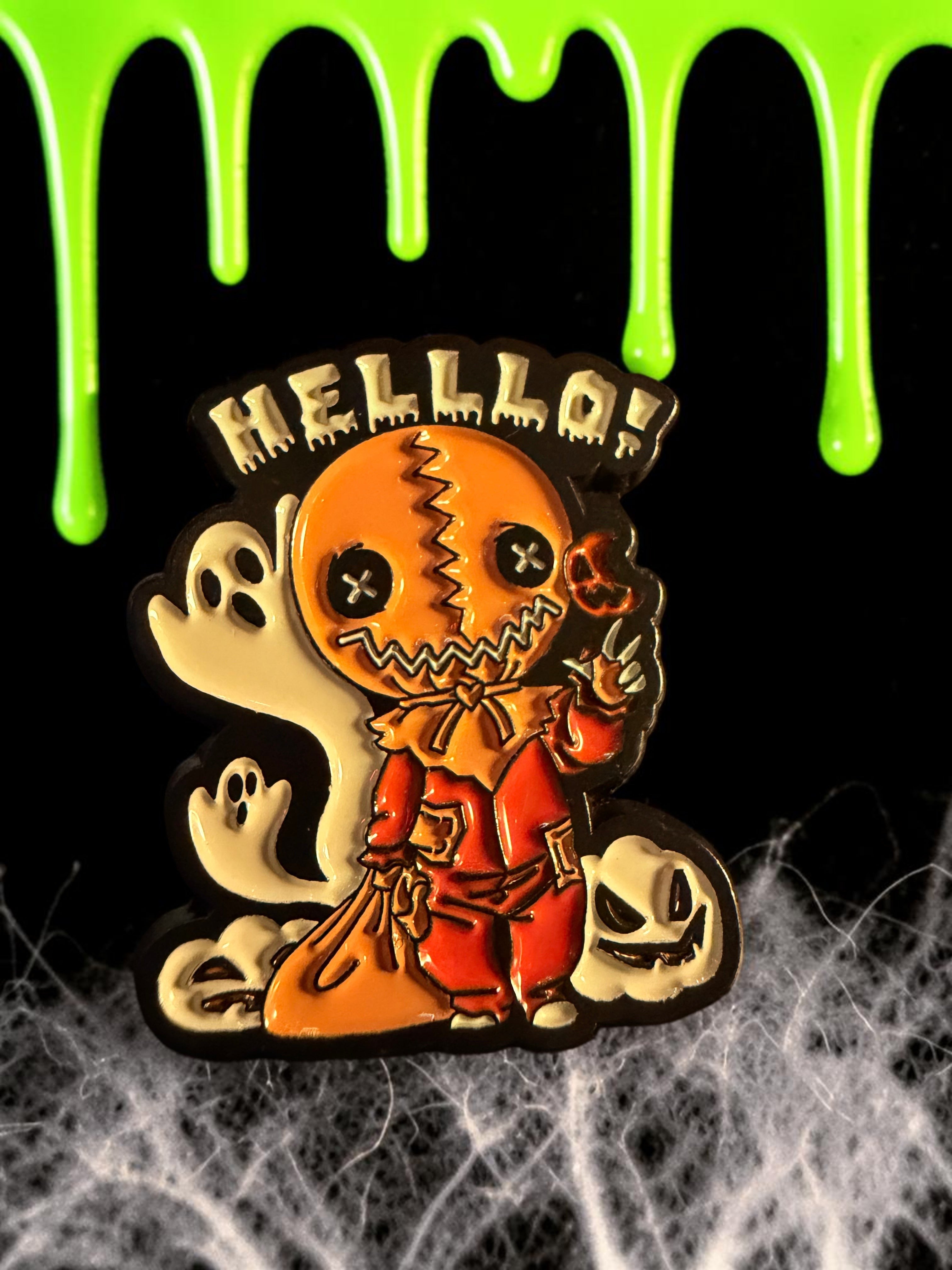 Halloween-Emporium Trick 'r' Treat Sam enamel pin featuring Sam with ghosts, orange pajamas, and a burlap mask.