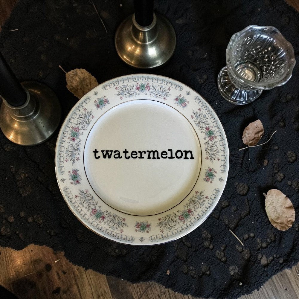 Halloween-Emporium upcycled vintage porcelain plate with floral rim and black twatermelon typography on black lace