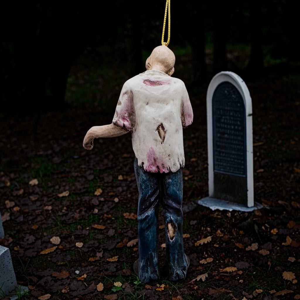 Halloween-Emporium undead zombie hanging ornament with tattered clothes and realistic textures for spooky decor.