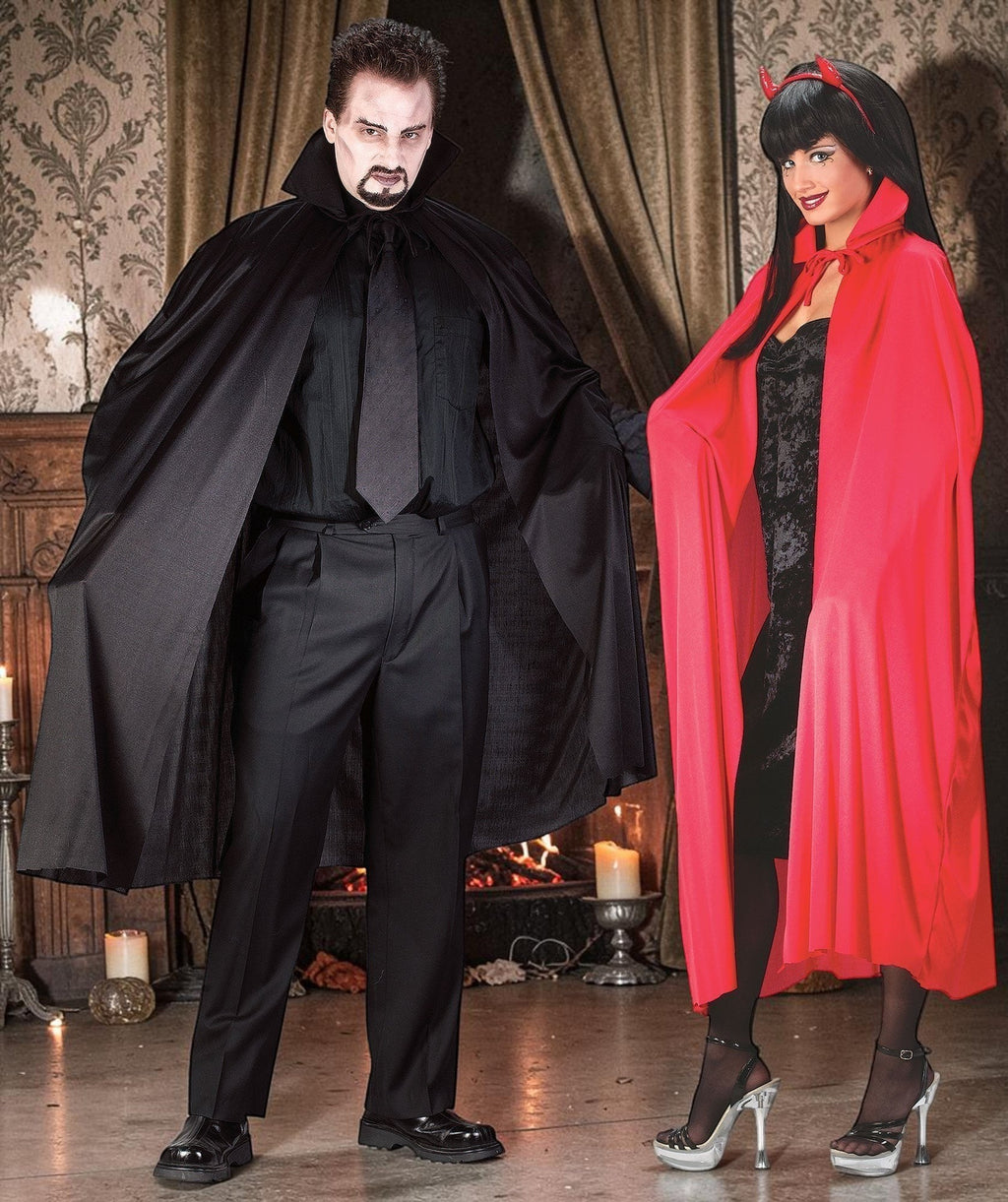 Halloween-Emporium unisex adult costume capes in black and red with stand-up collars worn by a man and a woman.