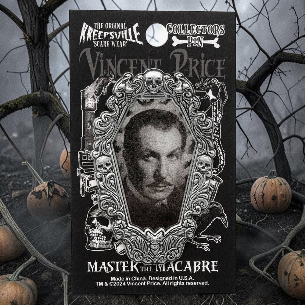 Halloween-Emporium Vincent Price enamel pin featuring a silver gothic frame with skull and bat details on display card.