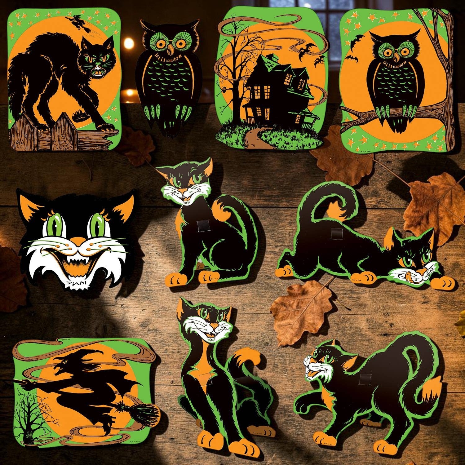 Halloween-Emporium vintage fluorescent Halloween cardstock cutouts featuring black cats, owls, a witch, and haunted house.
