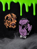 Halloween-Emporium werewolf and vampire soft enamel pins featuring classic horror monster designs on black background