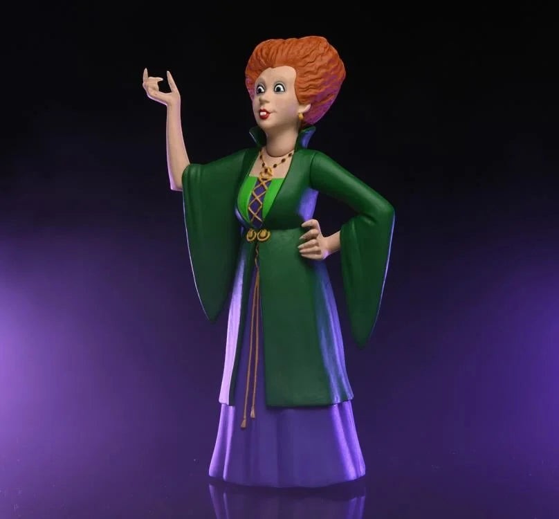 Halloween-Emporium Winifred Sanderson figure from Hocus Pocus with iconic red hair and green and purple velvet gown.