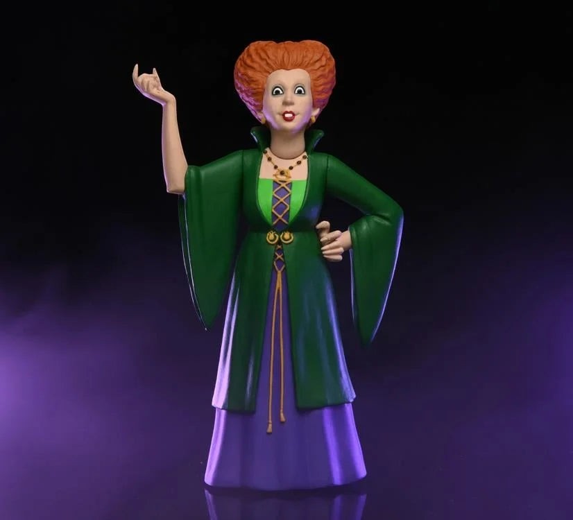 Halloween-Emporium NECA Winifred Sanderson figure wearing a green and purple gown with iconic red hair