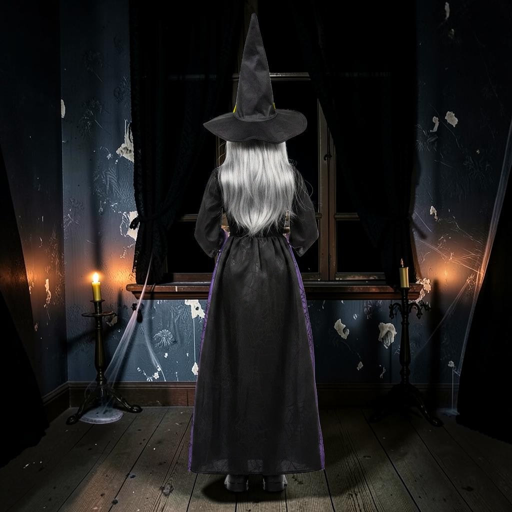 Halloween-Emporium 4-foot Winnie the Witch animatronic in a black and purple gown, viewed from behind in a dark room.