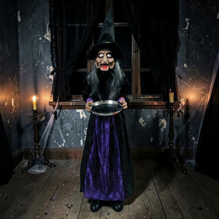 Halloween-Emporium 4-foot Winnie the Witch animatronic in a black and purple gown holding a silver tray