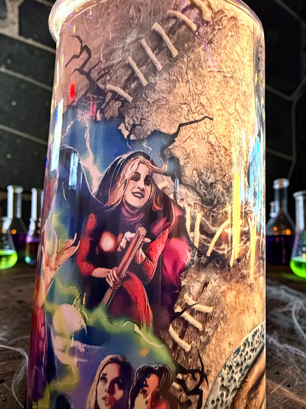 Halloween-Emporium 30oz tumbler featuring a sisterly witch trio print, dark-luxe aesthetic, and reusable metal straw.