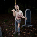 Halloween-Emporium undead zombie hanging ornament with realistic tattered clothing and gory details.