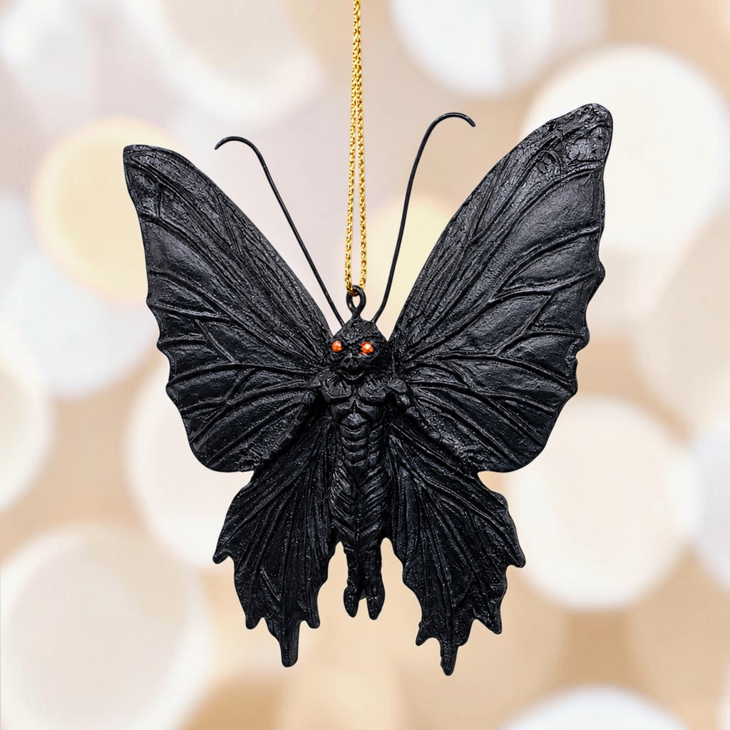 Halloween-Emporium gothic Mothman hanging ornament with black textured wings and piercing red eyes.