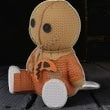 Halloween-Emporium Trick 'r Treat Sam vinyl figure with a burlap-textured mask and orange pajamas.