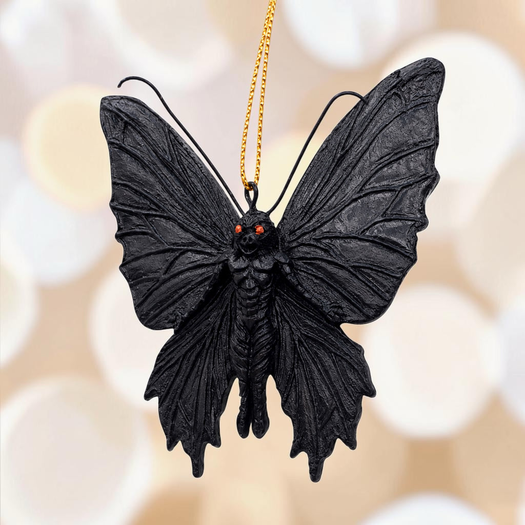 Halloween-Emporium black mothman hanging ornament with intricate textured wings and glowing red eyes.